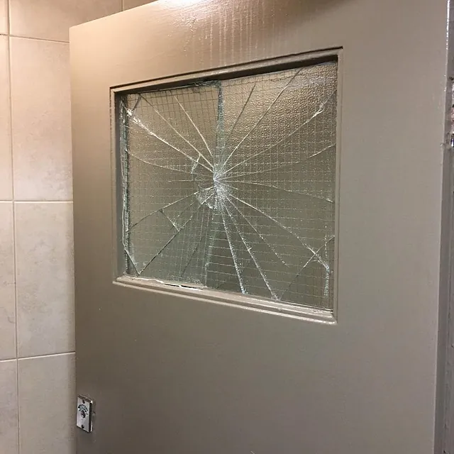 Broken bathroom door glass